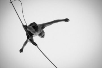 Person on a tightrope